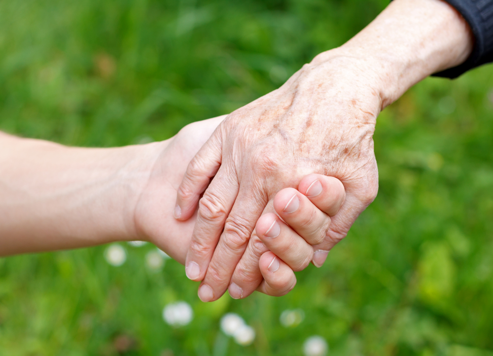 dementia caregiver, holding hands.jpg